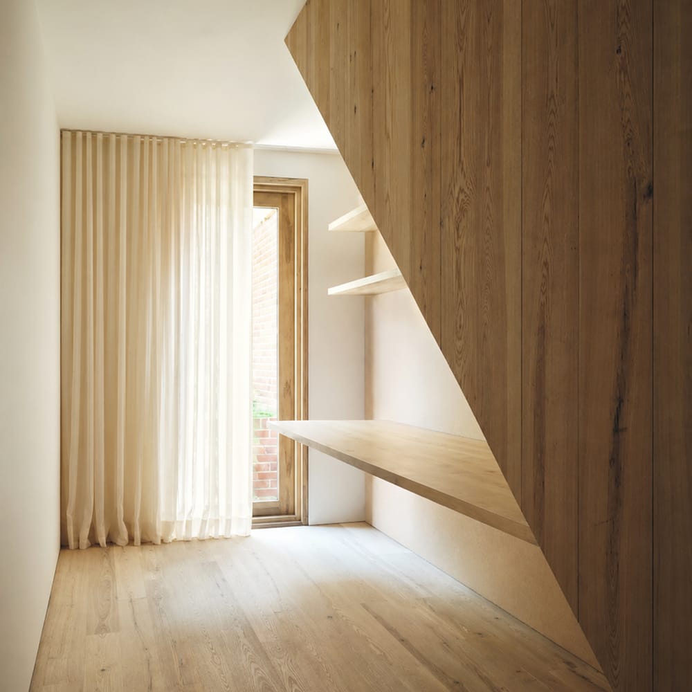Soft linen curtain in warm afternoon light minimal interior photography